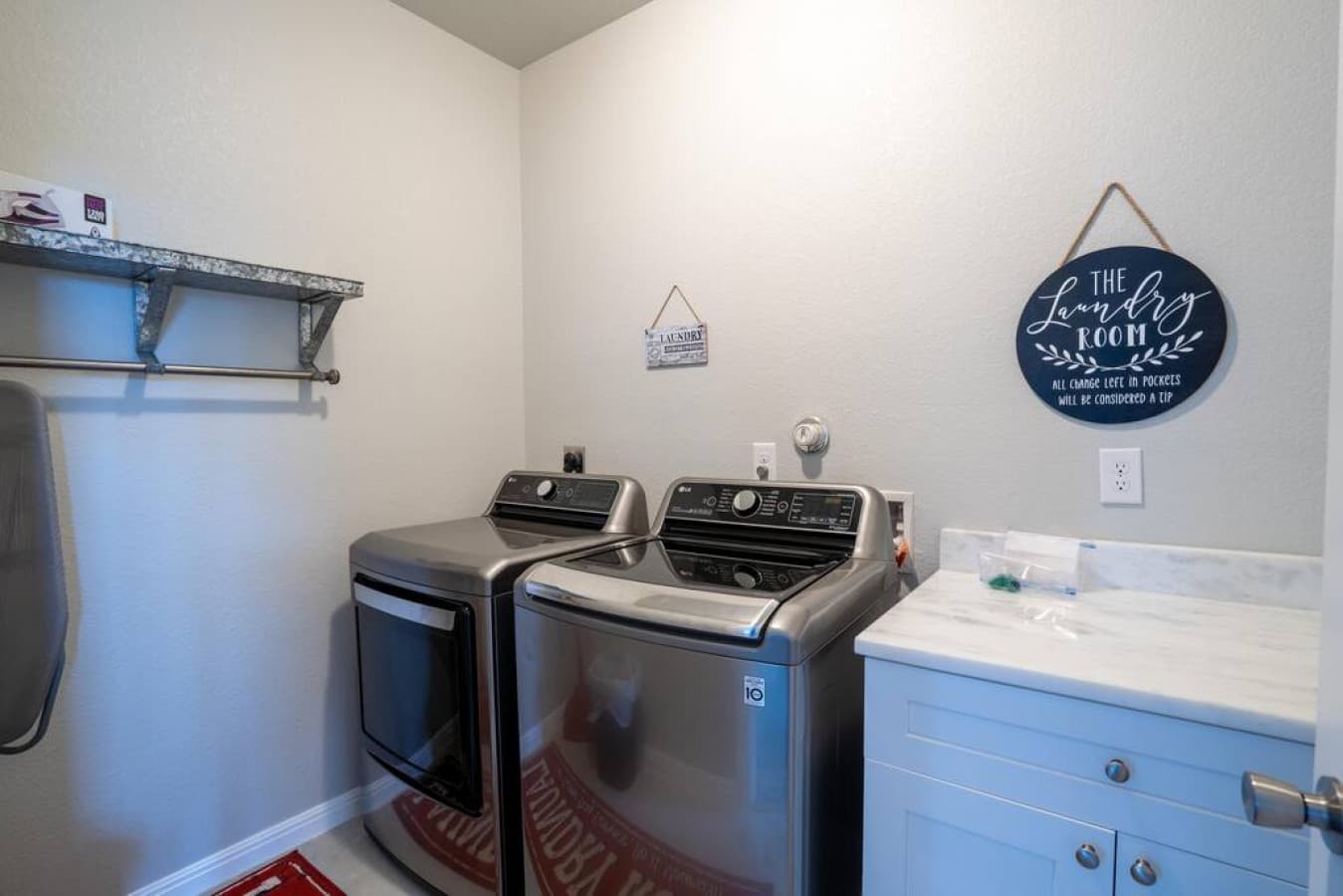 Laundry room is ready to go with large capacity LG washer & dryer. Iron, ironing board also available.