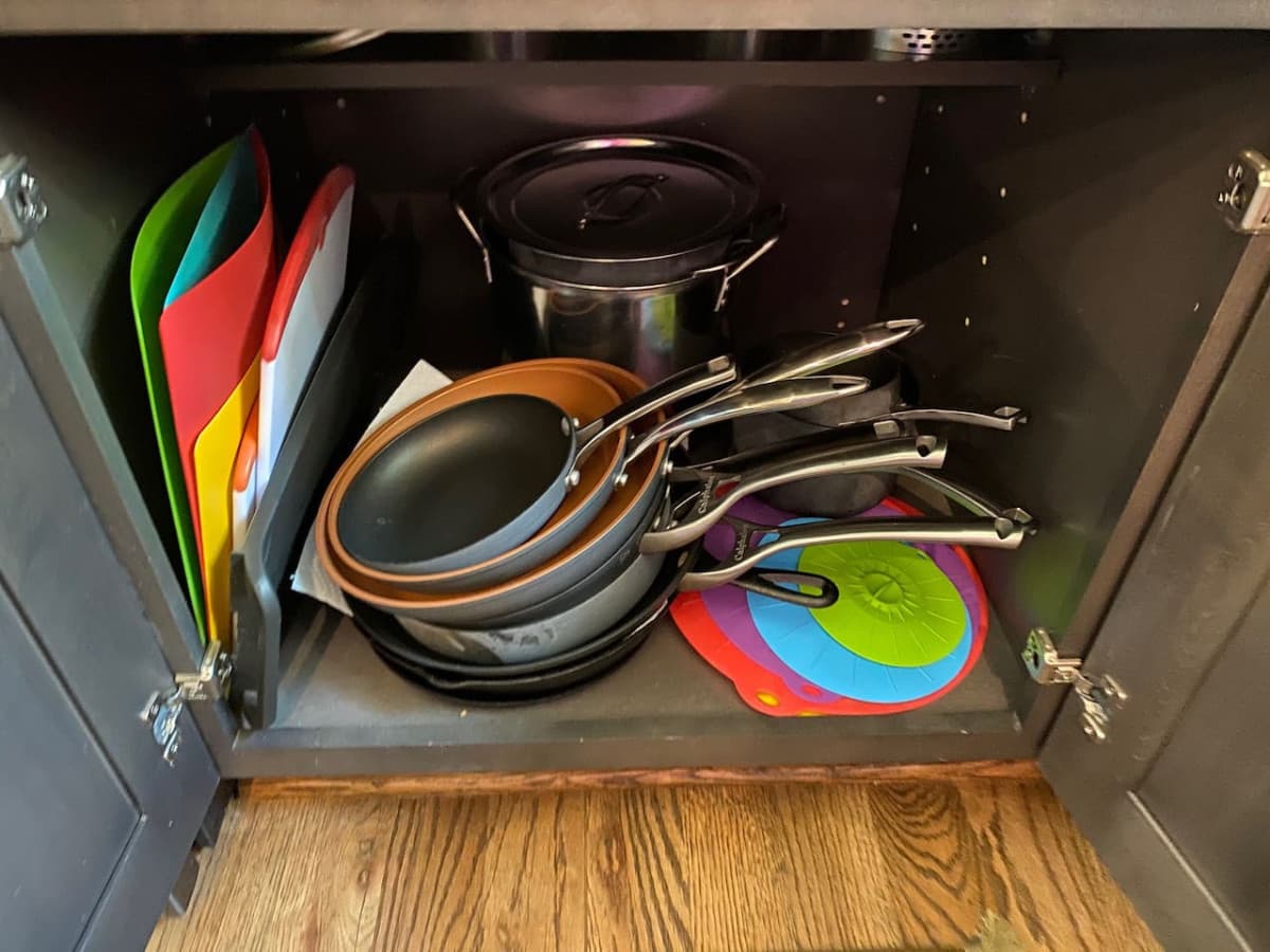 Pots and pans along w/skillets to cook with and cutting boards.