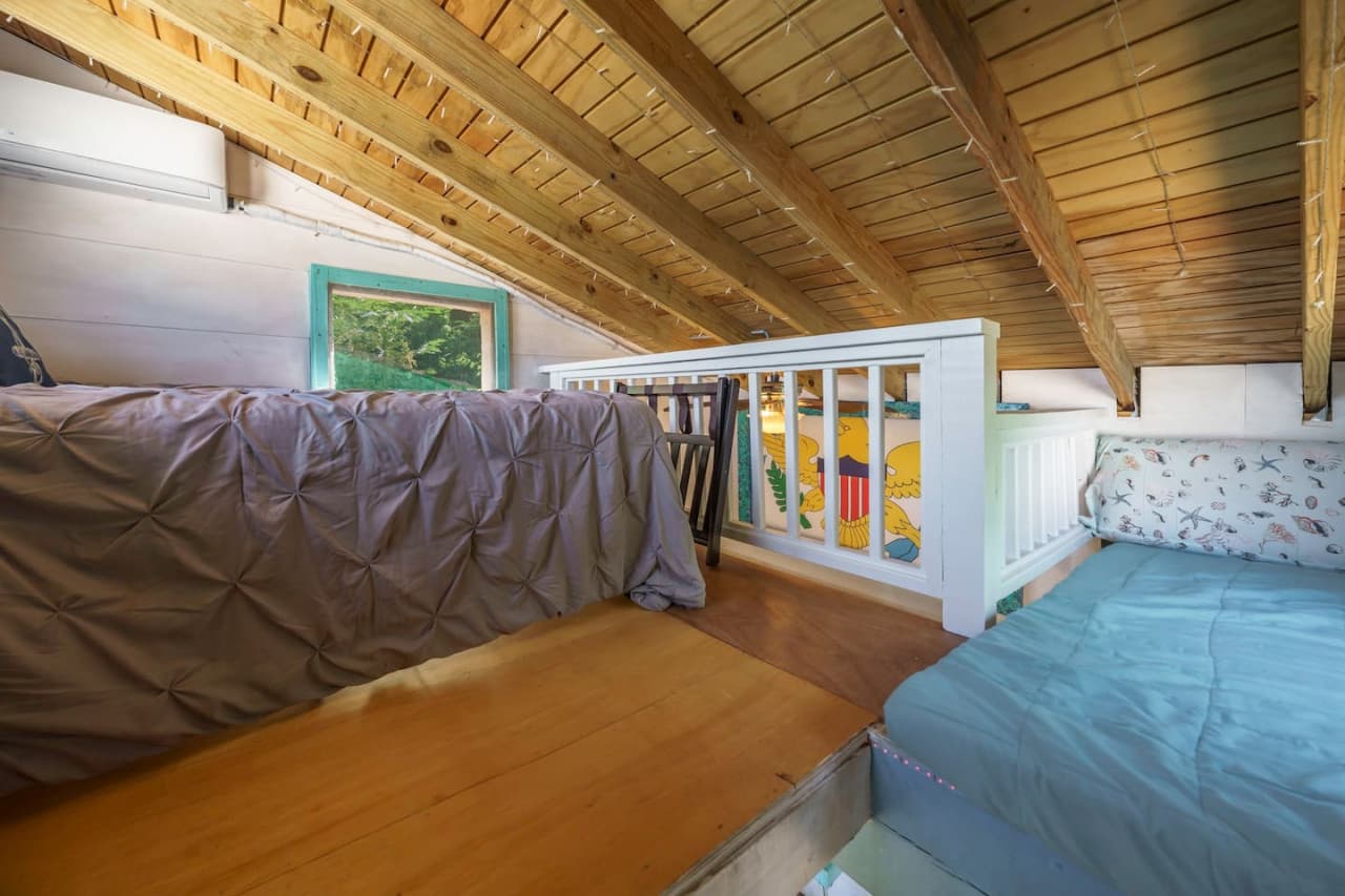 Tiny House upstairs with full size bed and a twin!