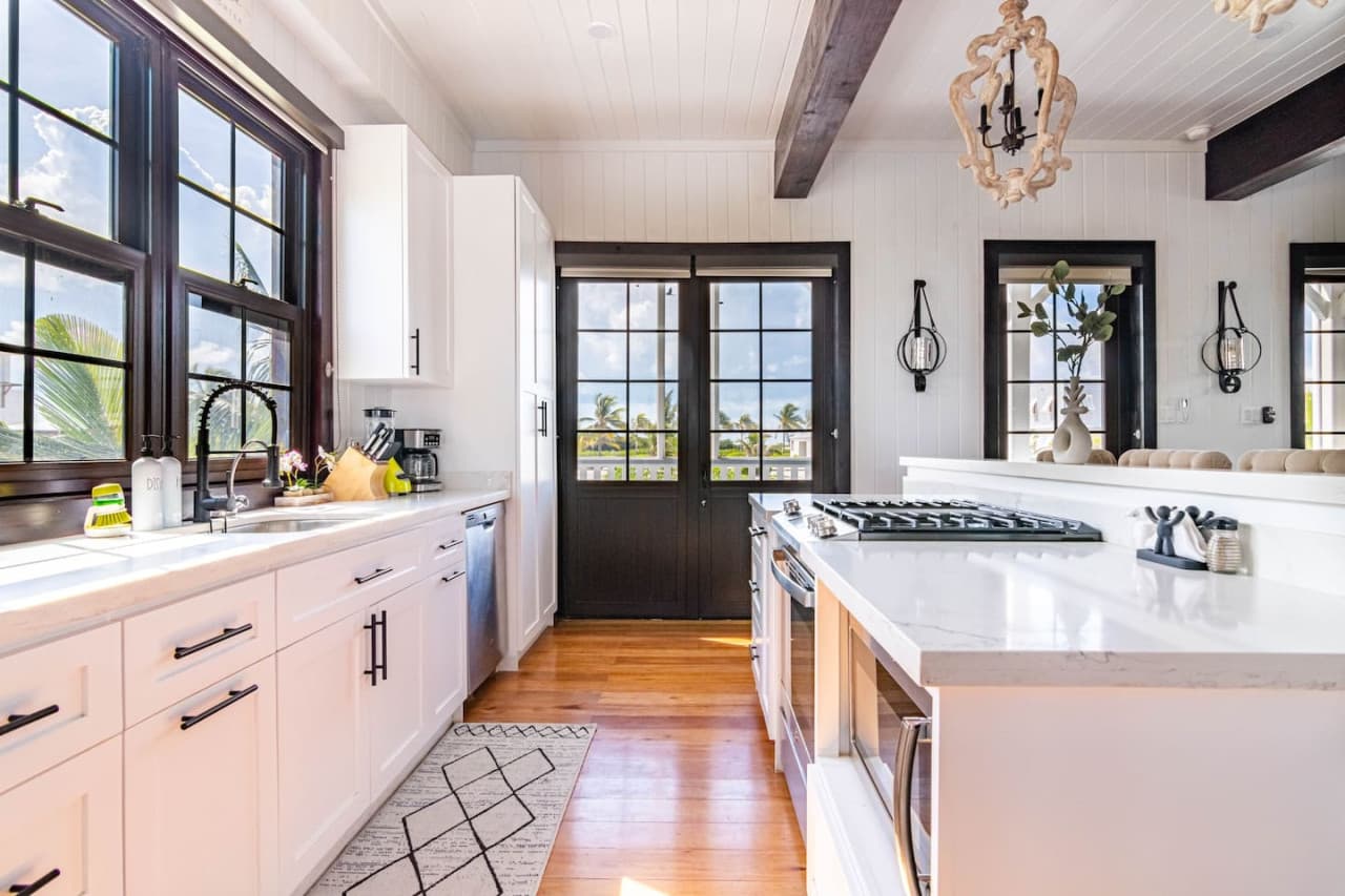 Full Kitchen Area with french doors to balcony.