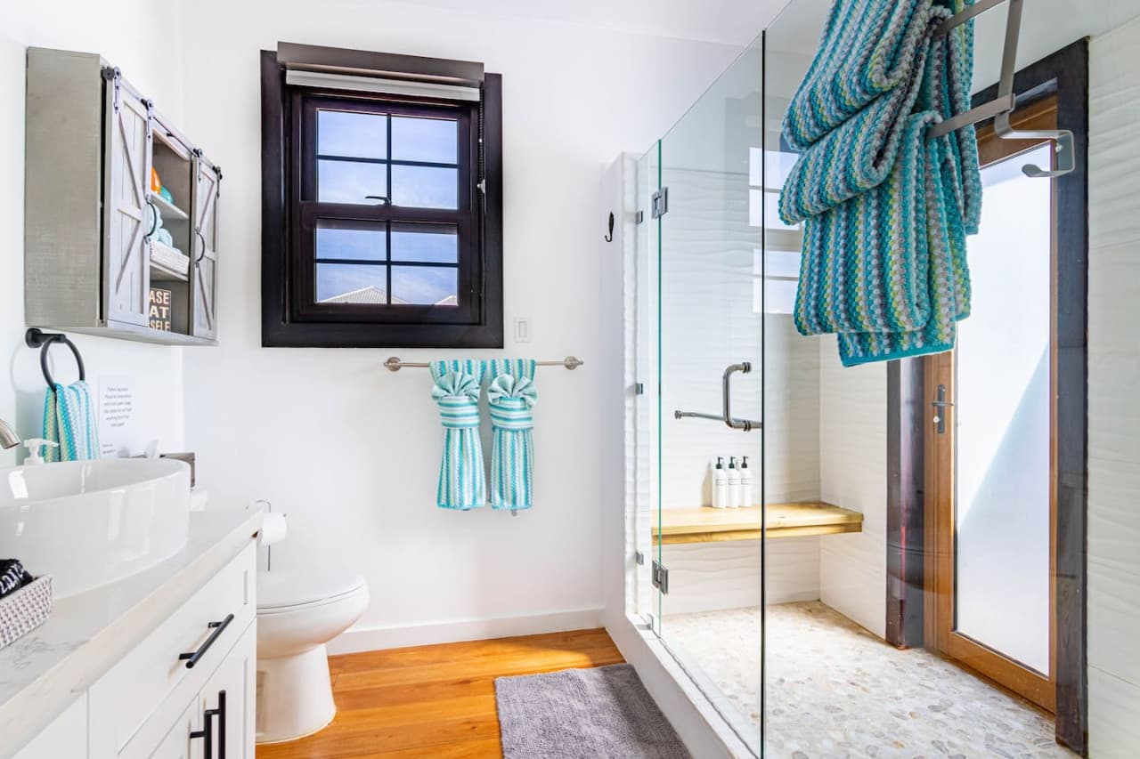 Master Bathroom showing door to exterior shower.