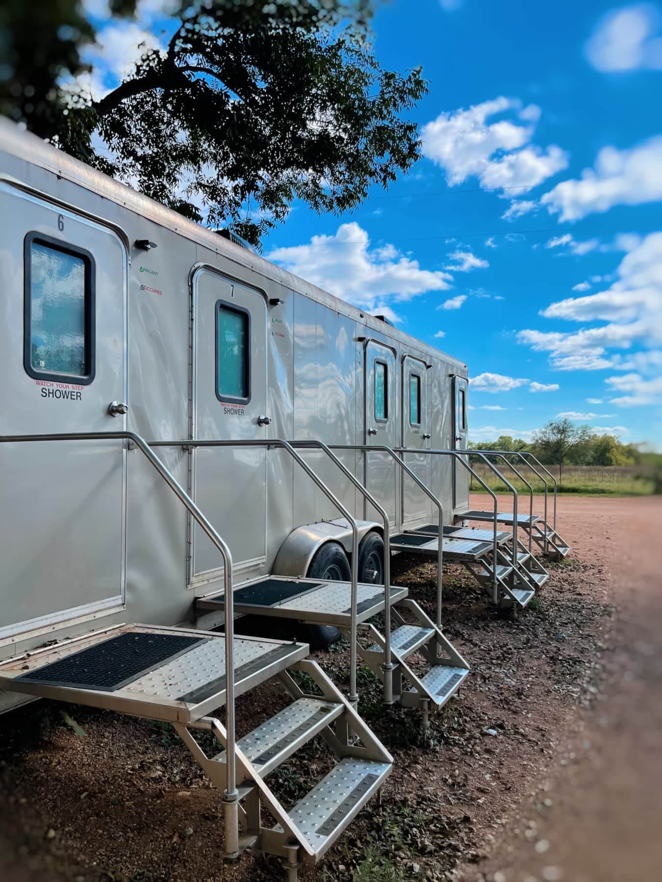 There are 6 private lockable bathrooms with hot showers behind the glamping cabins.