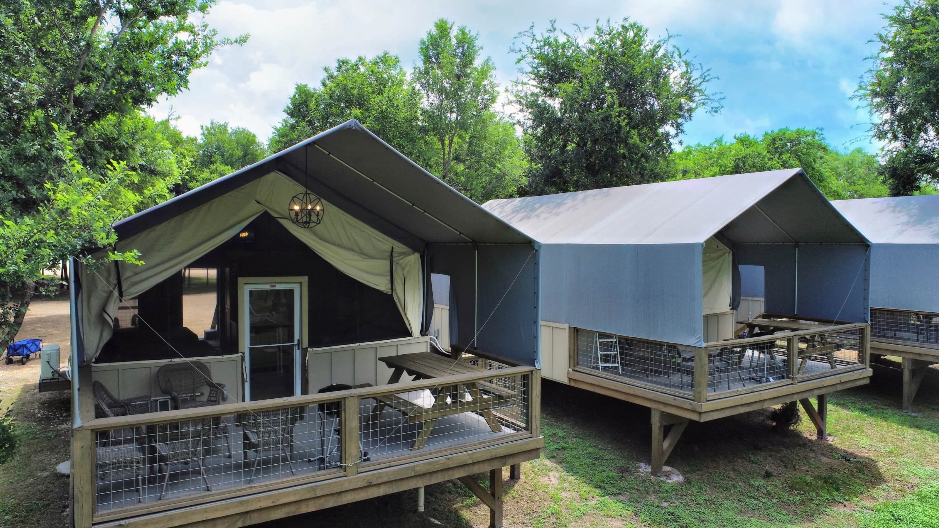 Rear decks overlook the beautiful creek bottom and creek