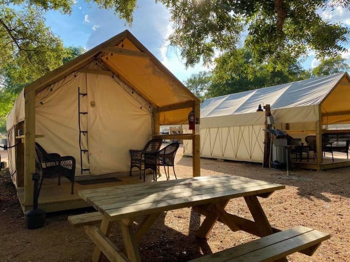 Each Glamping Cabin has it's own picnic table and BBQ pit!