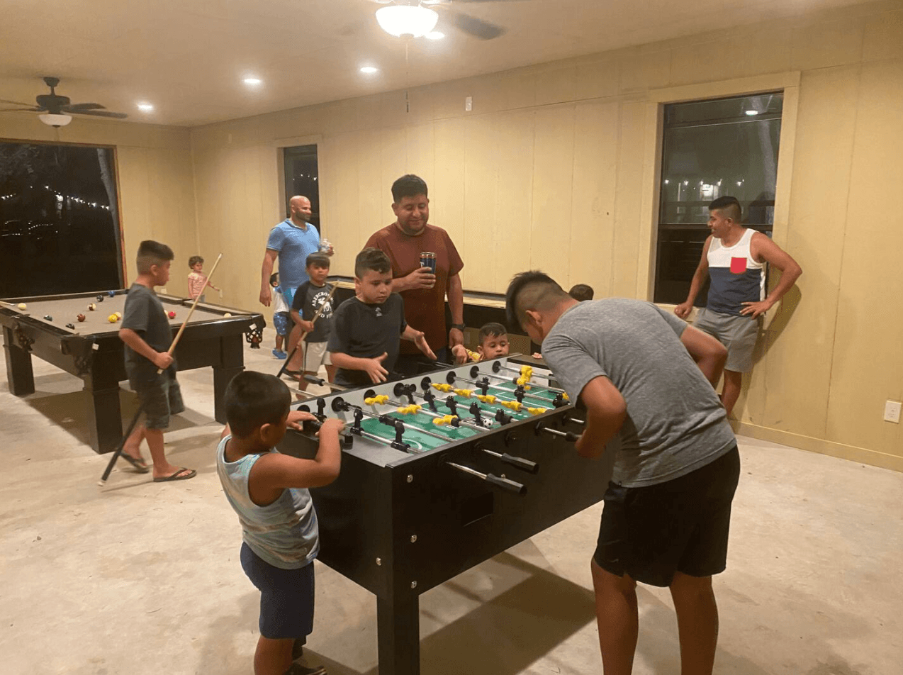 The game room has: shuffle board, foosball, pool table & ping pong table! 