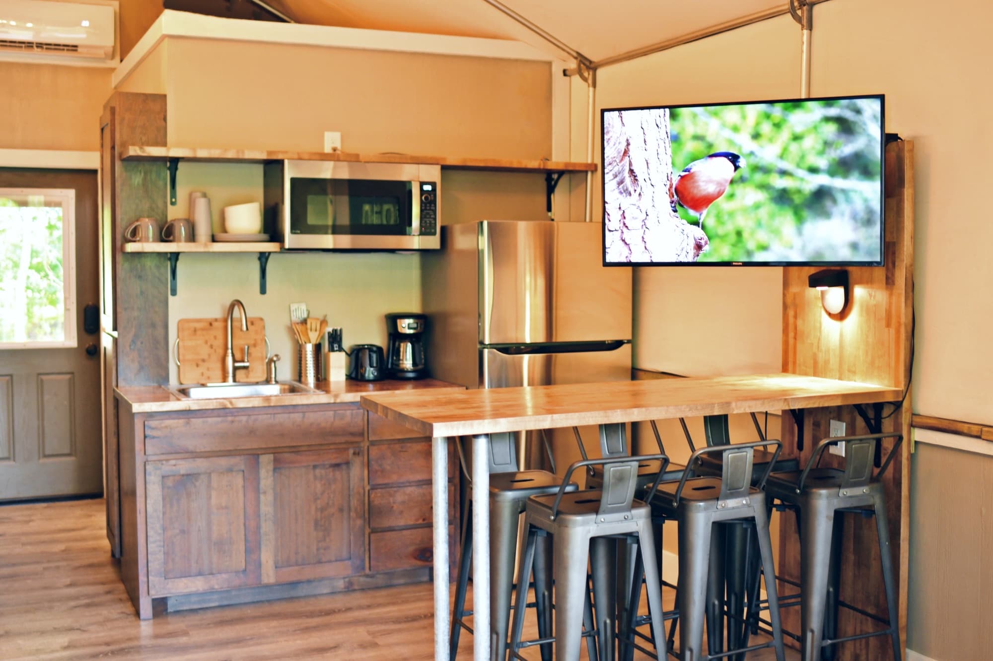 Full Sized Fridge, Convection Oven Microwave, and An Electric Hot Plate Stove, and Outdoor Grill Giv