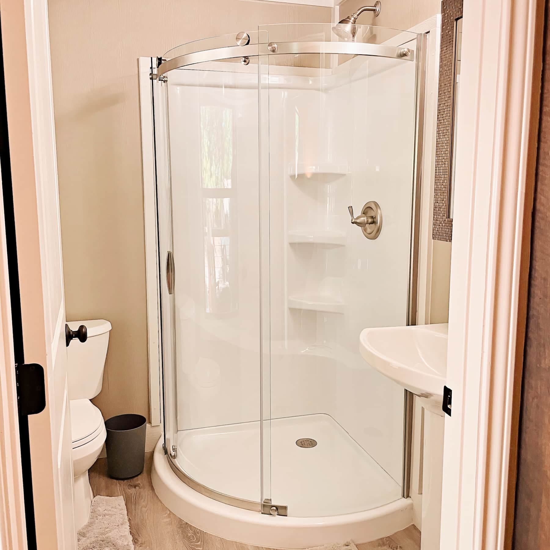 Bathroom comes with a shower, toilet and sink!