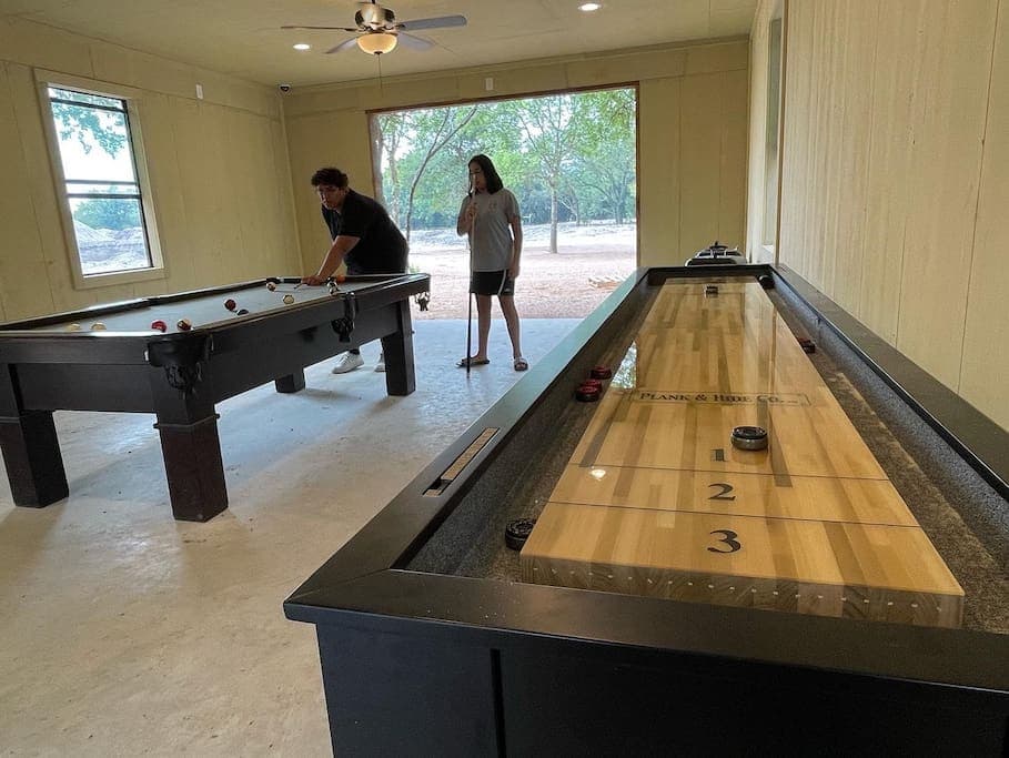 The game room has: shuffle board, foosball, pool table & ping pong table! 