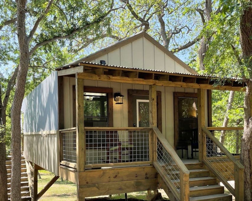The cabins are situated up high to get out of the flood plane and overlook the creek bottom 