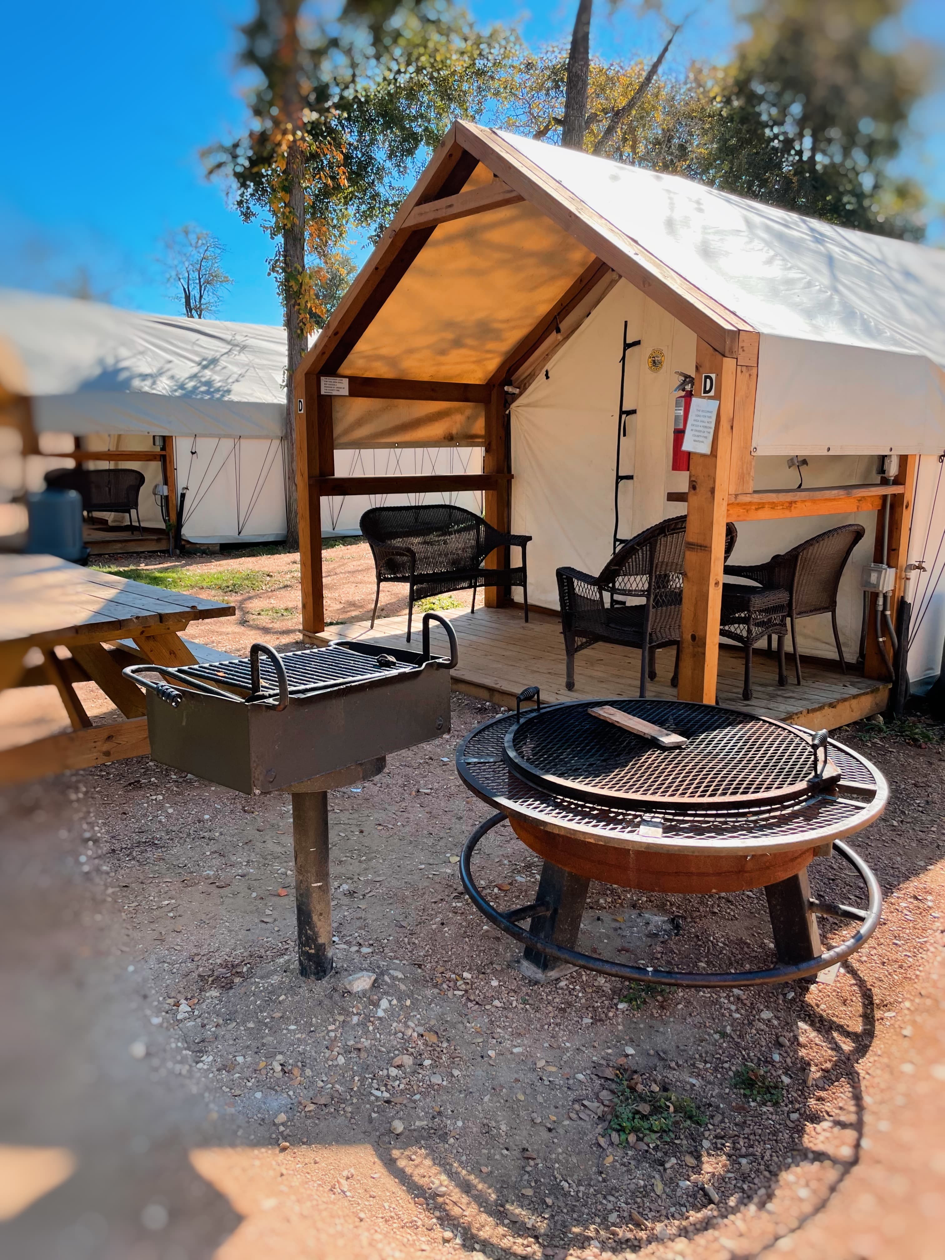 Nice and comfortable cabins with chairs, bench seat, and table