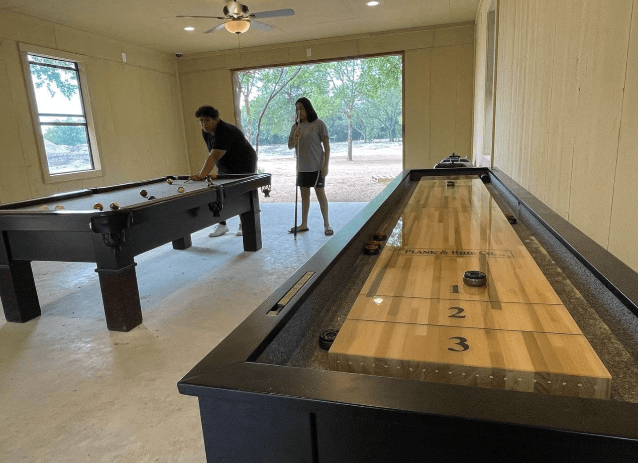 The game room has: shuffle board, foosball, pool table & ping pong table! 