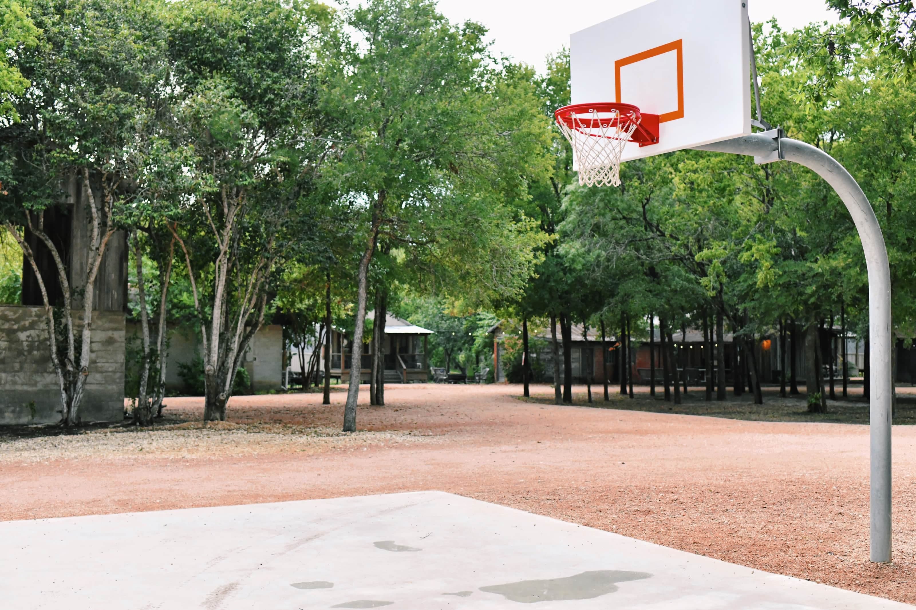 Basketballl court with two goals onsite