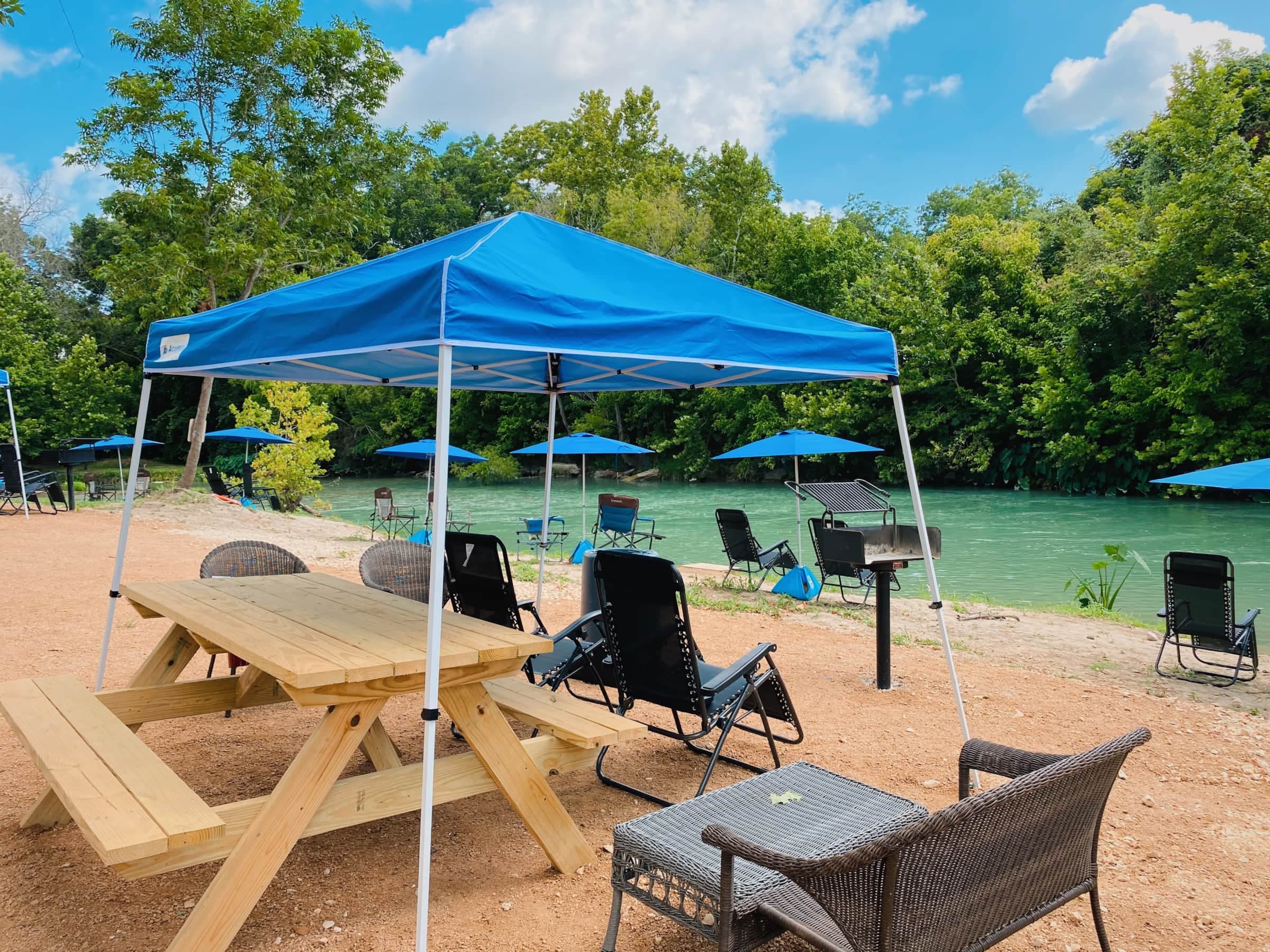 Covered riverside picnic tables