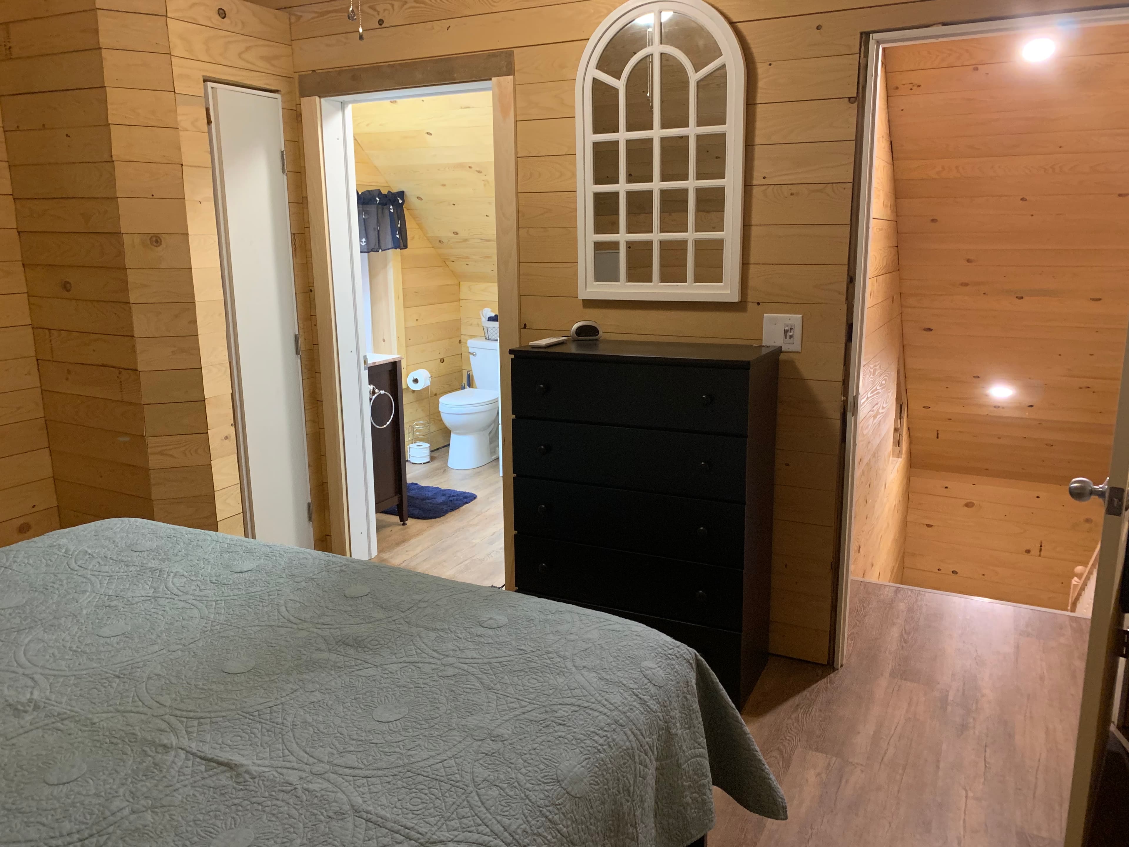 Master Bedroom (right door entrance from stairs, left door to master bath with washer and dryer).