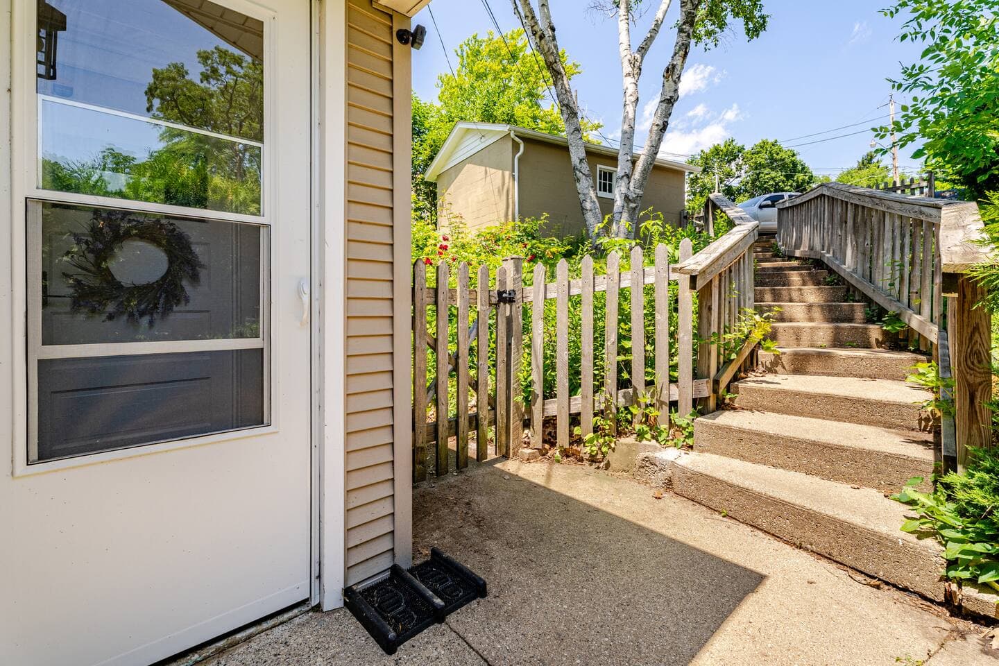 Entry to home does have stairs to walk up to get to parking level (next to garage).