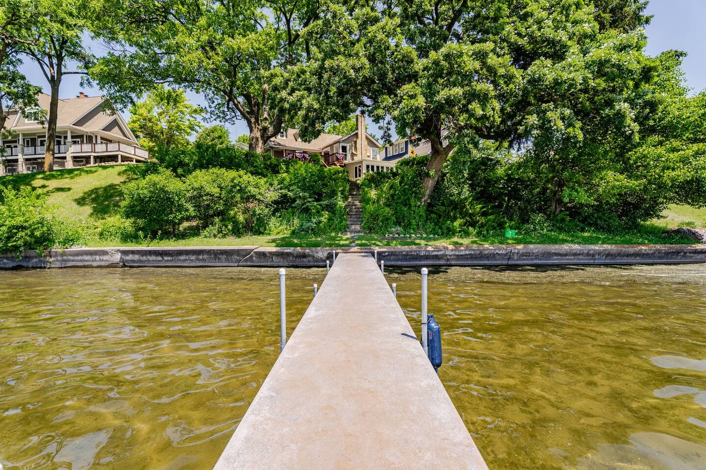 View of home from pier. We offer one of the most private views of Bohner's Lake from the north end of the lake!