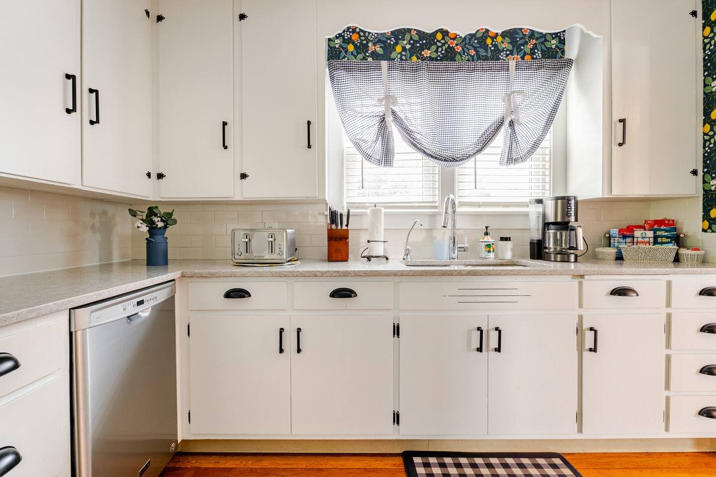 Cabinets host kitchen equipment to stay in a prepare meals. Ninja drip coffeemaker and basic coffee station provide essential tools for the early bird that loves their cup of Joe.