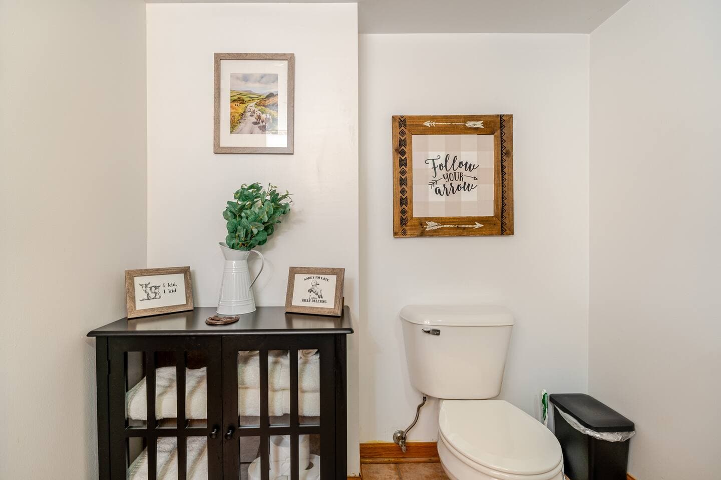Extra towel storage in full bath located in walkout basement.