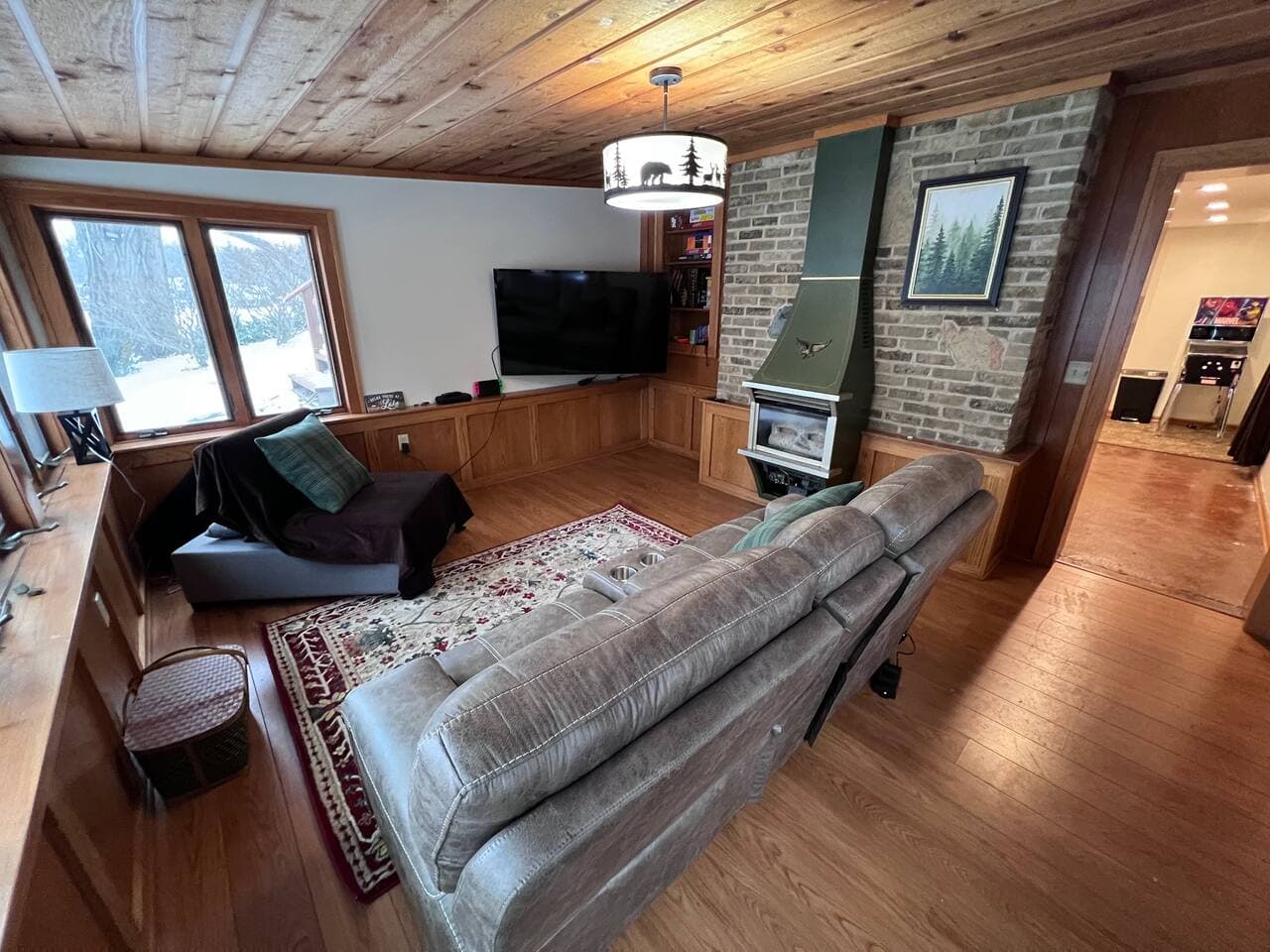 65" HDTV can be used as the gaming area or a secondary area to watch the big game while getting fantastic views from Bohner Lake.