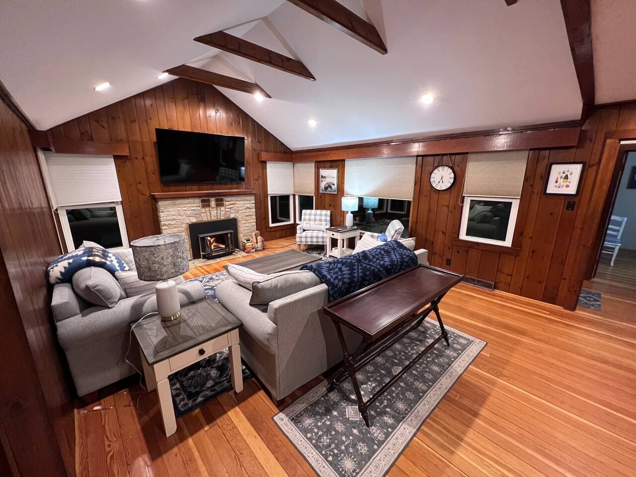 Woodburning fireplace in living room.