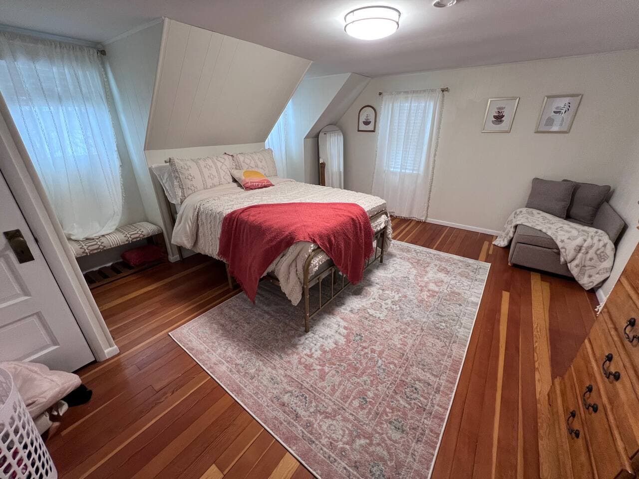 2nd bedroom hosts full body mirror and closet to left of bed. Sofa bed (in corner) folds out to a twin size bed as well.