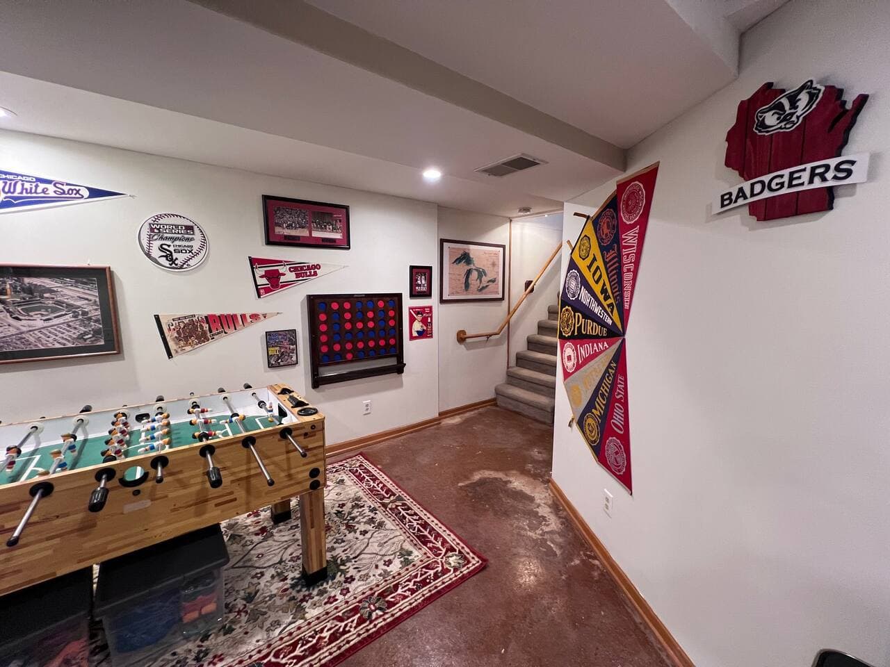 We host a few sets of kid toys underneath the foosball table and well as a foldout poker table for Game Room.