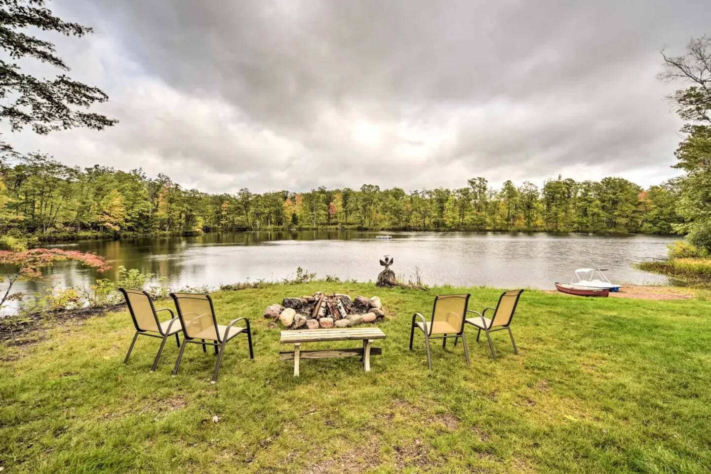 Backyard view of Big Tower Lake, Little Tower Lake is to the right of Big Tower Lake. Lots of pan fish in Big Tower Lake.  Also enjoy the family of otters that love to visit.  Canoe, 2 Kayaks and Pedalboat on site for your use. Dock too