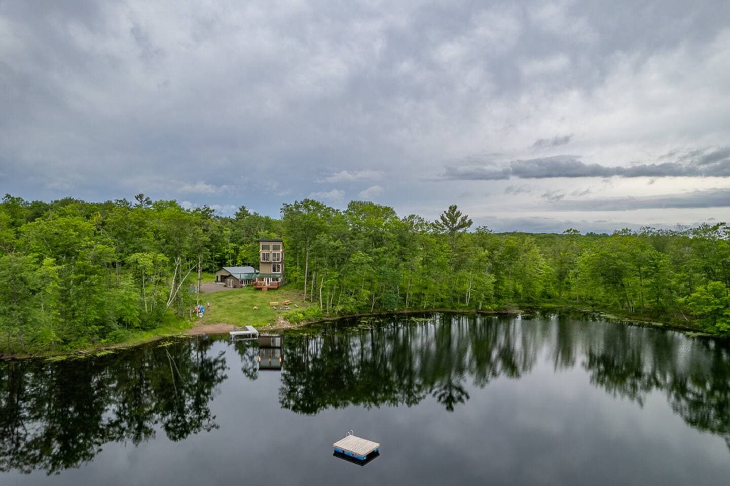Arial view of tower home and cabin