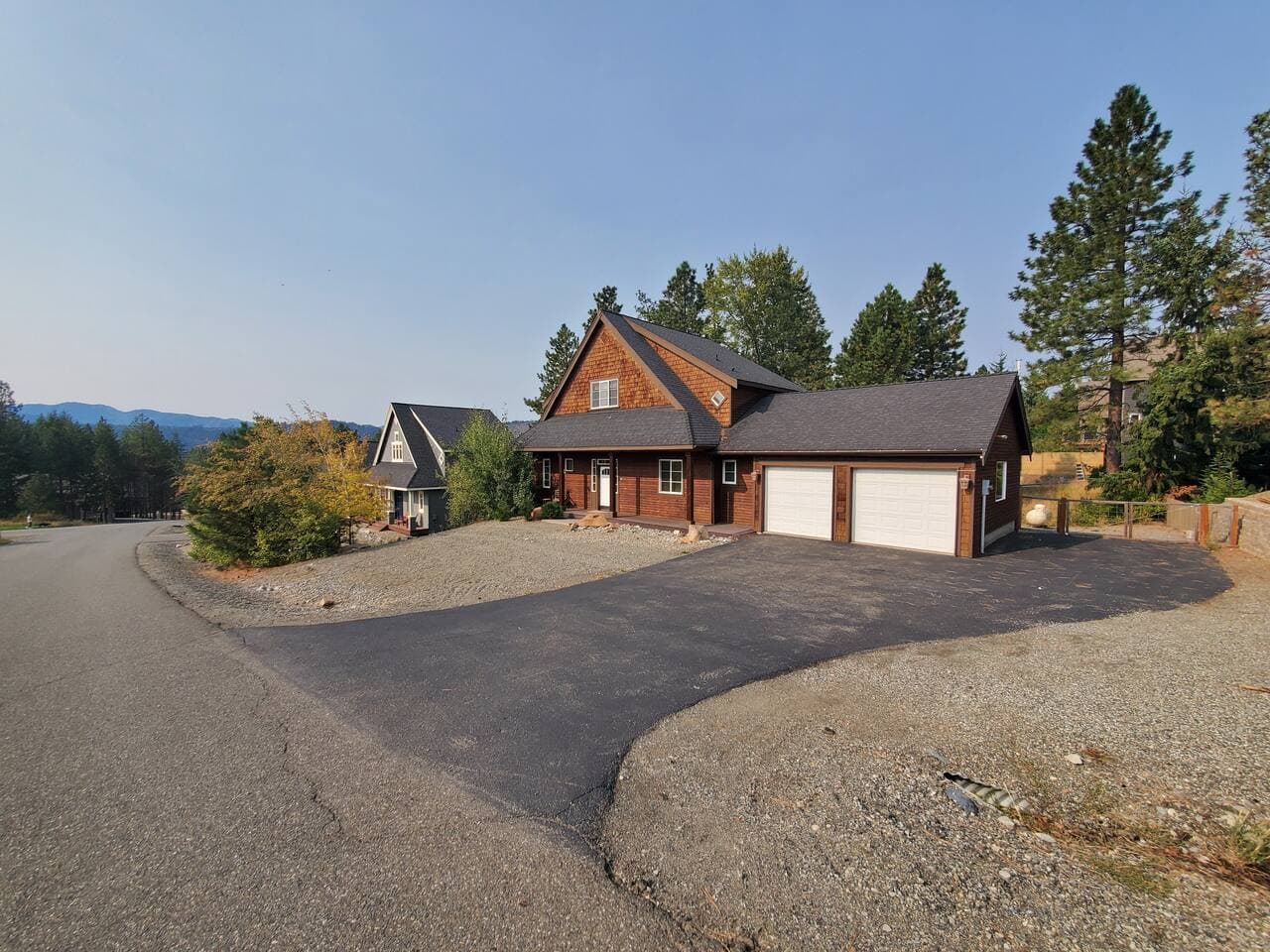 A home within the mountains.  Mountain views surround.