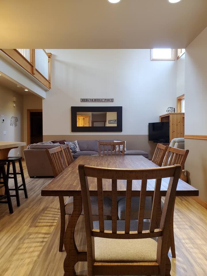 Dining room to living room open concept feel.