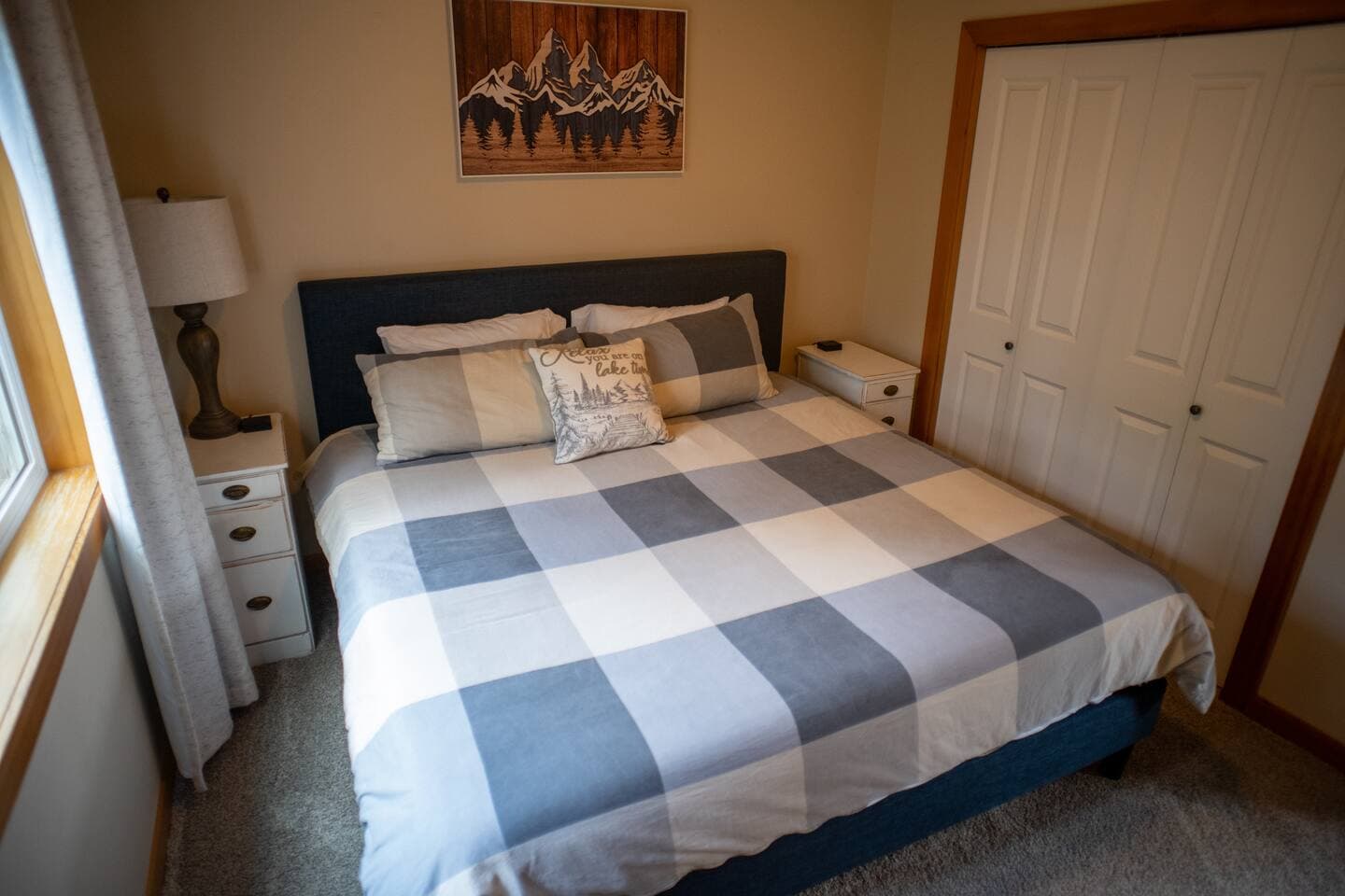King bed with nightstands, and bedside outlets that accepts 110v plugs or USB for your charging needs.