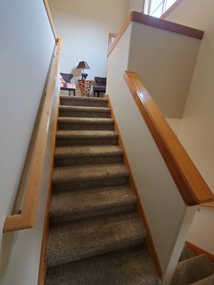 Stairs to the top of the upper floor.