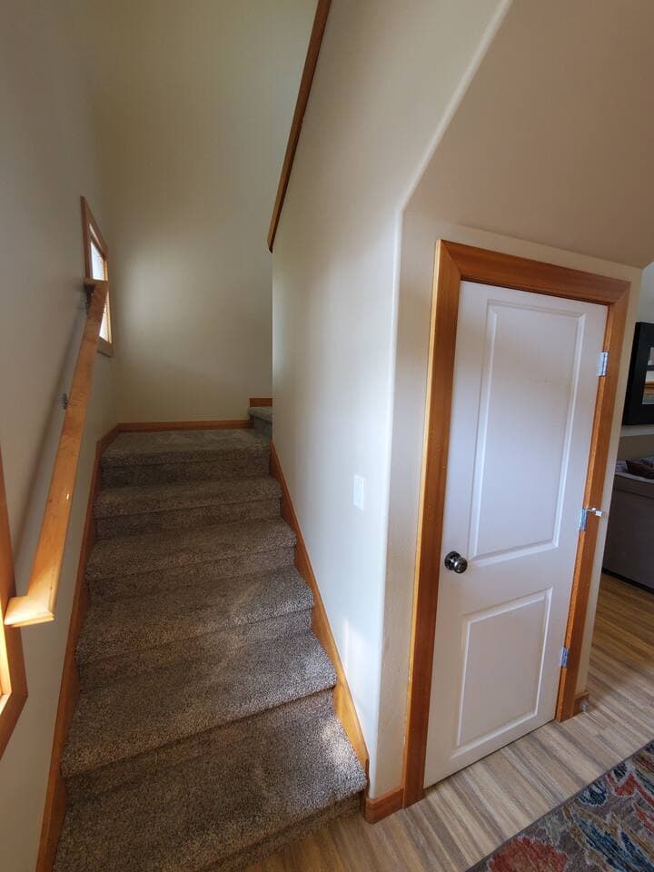 Stairs from lower to middle landing. Coat closet available.