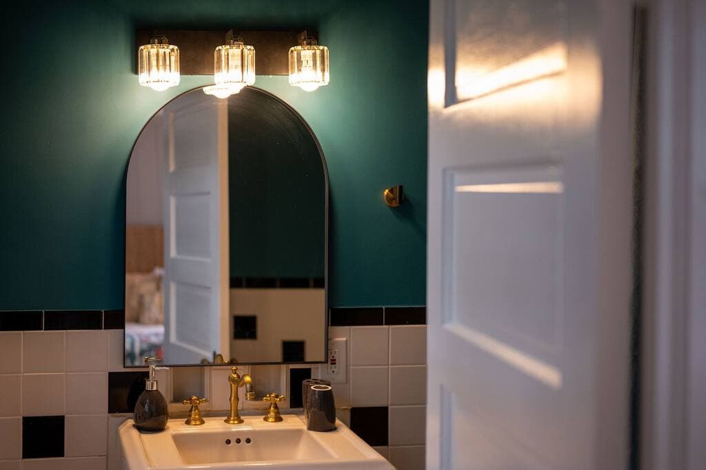 Close Up of Flamingo Studio Mirror and Pedestal Sink