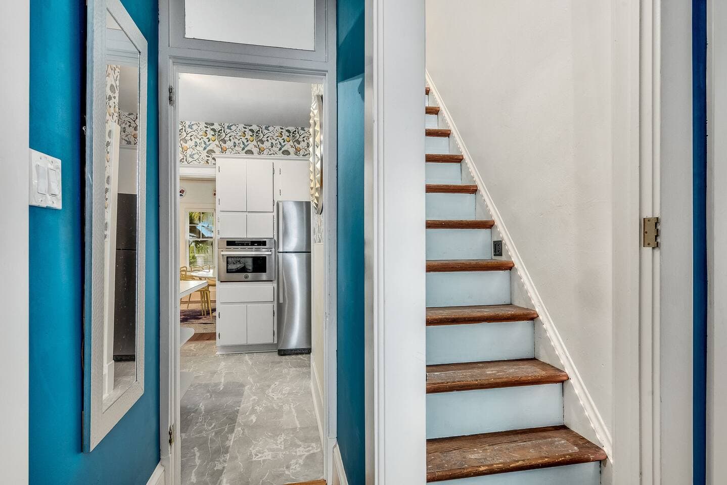 Hallway View of Kitchen and Stairs