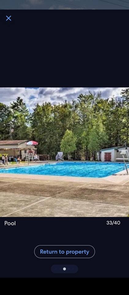 By car only 2 minutes away, by foot only 9 minutes away!! bring your swimming shorts and sunblock and enjoy this beautiful heated olympic  sized pool community pool