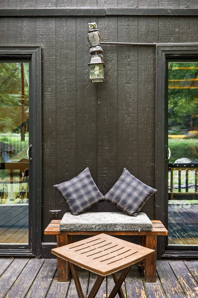 outdoor seating area with cushions put your drinks on the small table in front of it
