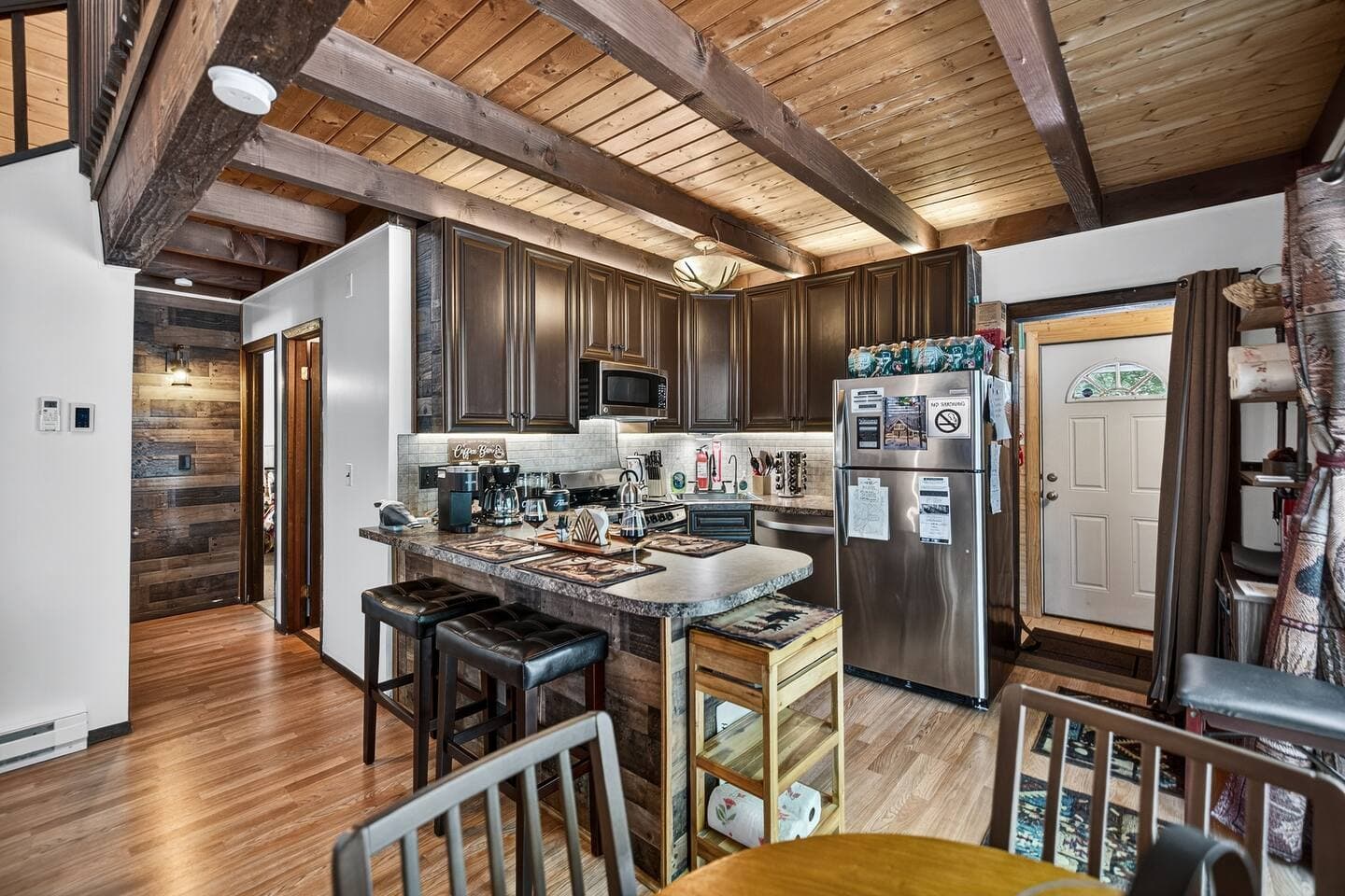 imagine having a beautiful breakfast while enjoying your coffee in this beautiful kitchen