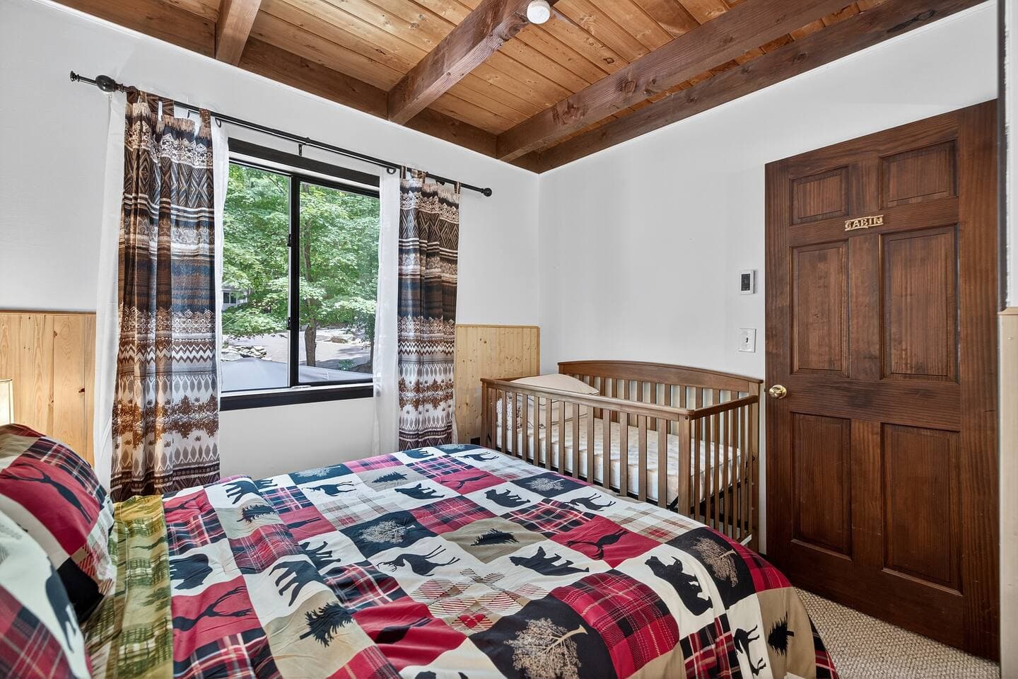 included in the third bedroom is a baby crib