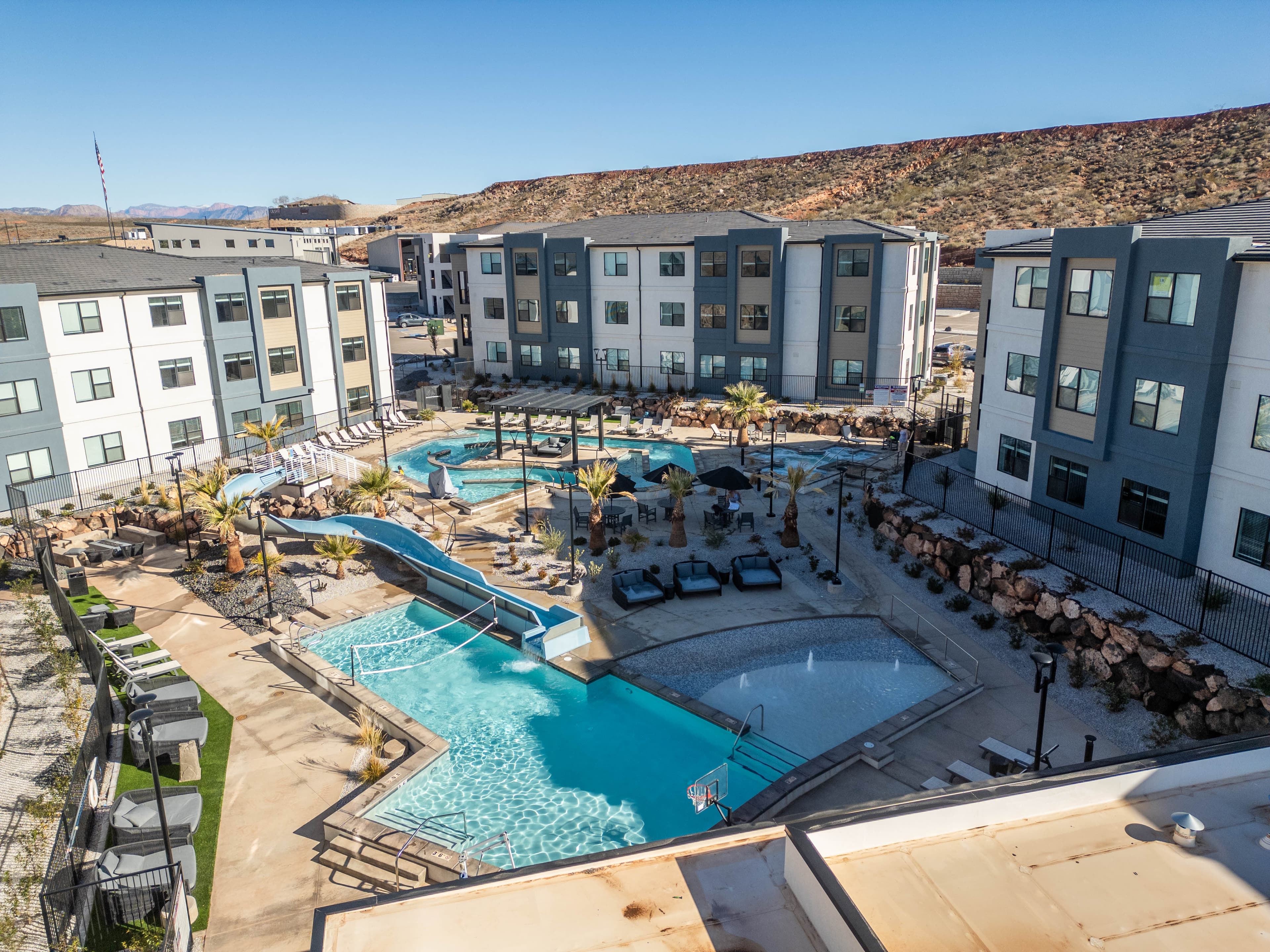 Pool volleyball, fire pit, and splashed