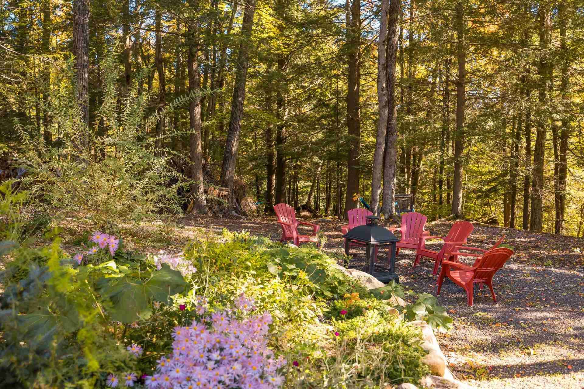[Backyard] Outside wood fireplace with chairs
