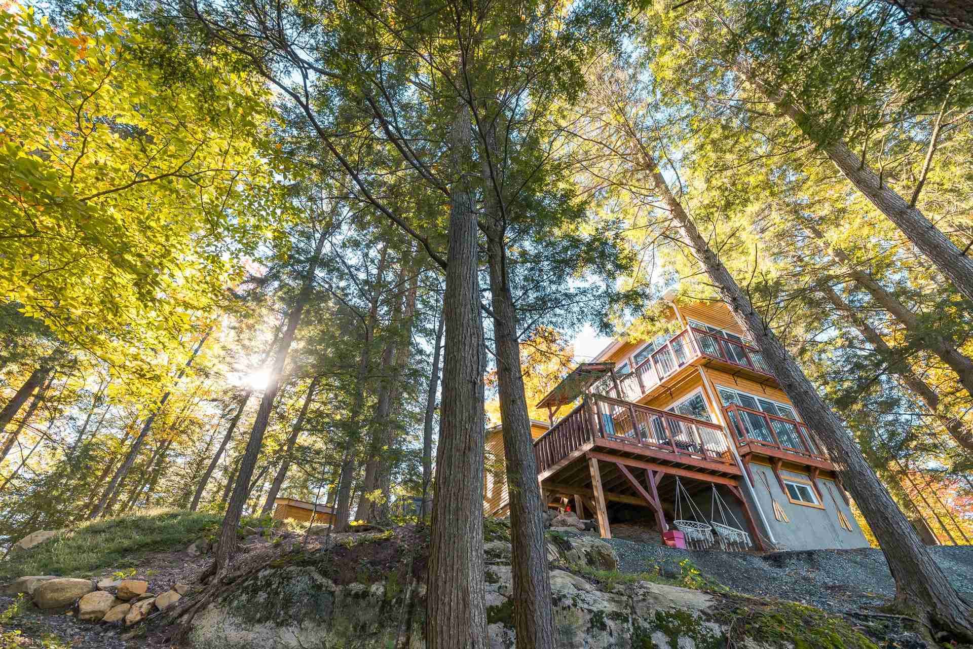 Chalet is sitting on top of a mountain