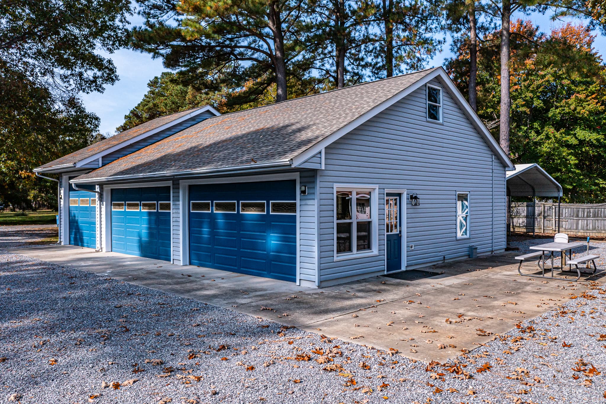 Detached garage with 2 bays converted to a recreation room.