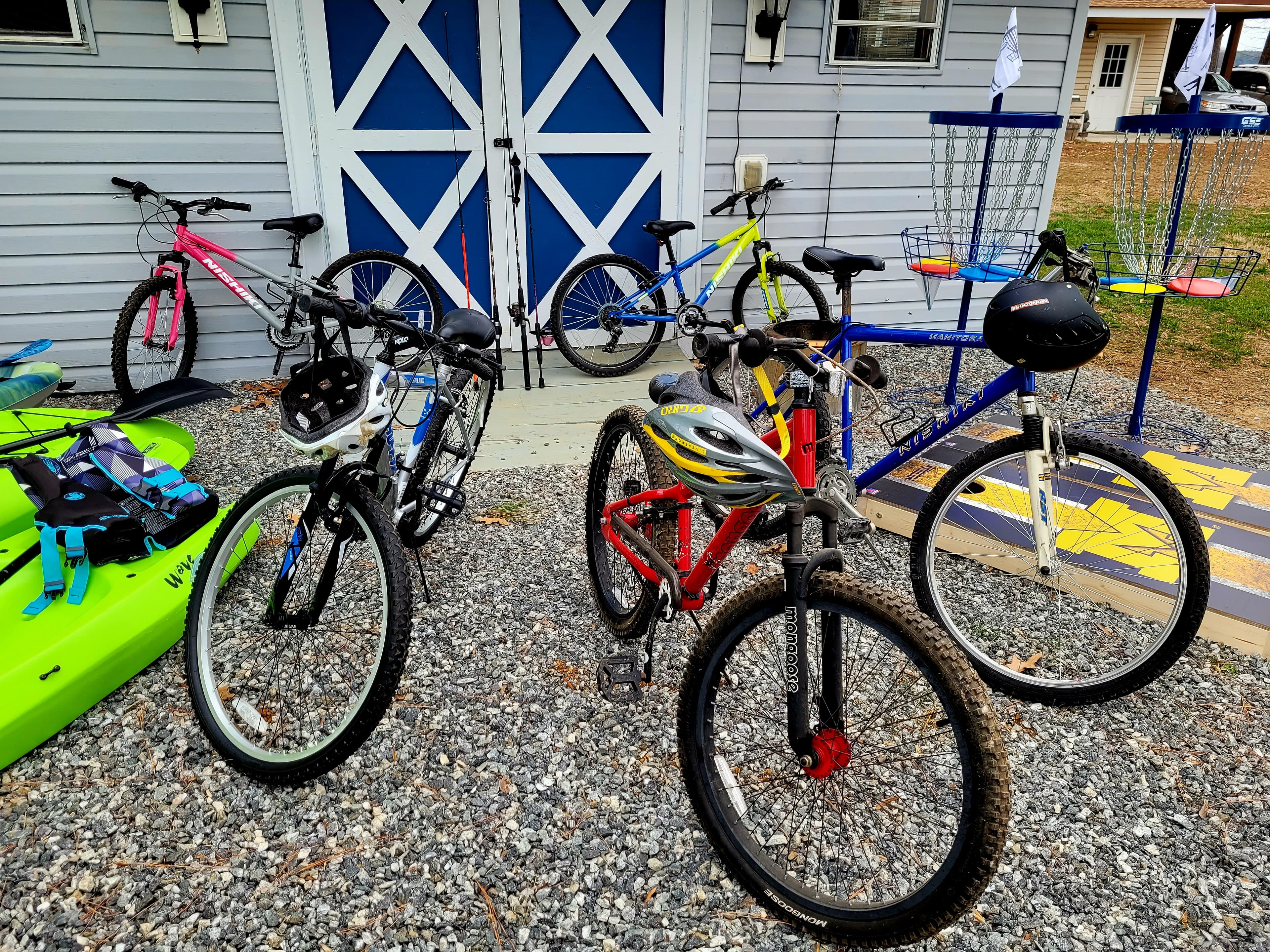 7 bicycles (includes 1 tricycle), helmets, fishing poles and tackle box (not shown: tricycle)