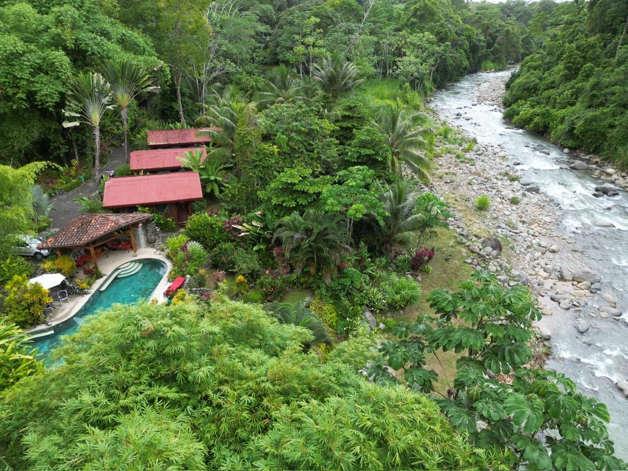 Casitas Del Rio Riverfront Nature Lodge vacation property in Costa Rica with a river