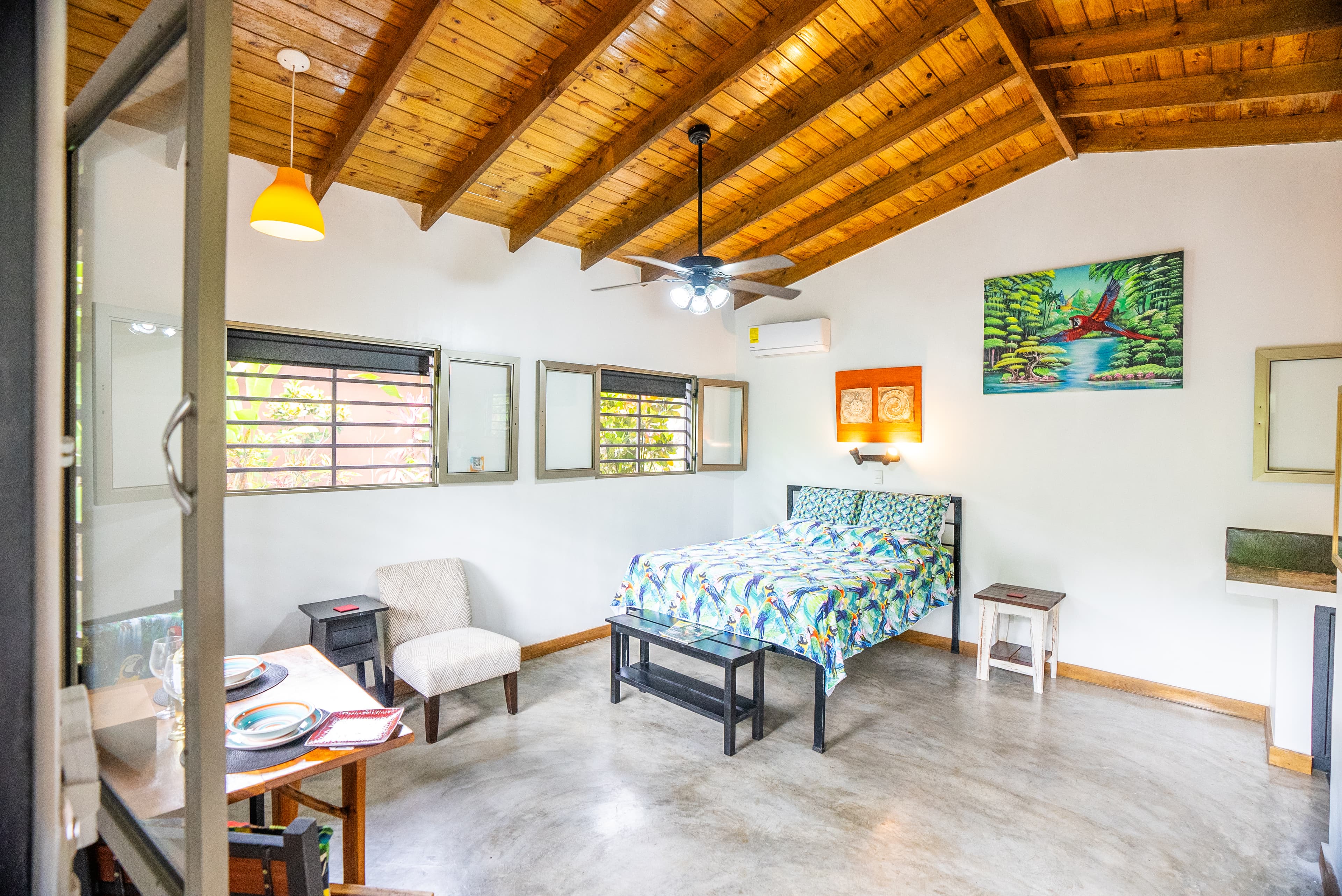 Private home nestled in the tropical gardens, beside a river, and near the beach