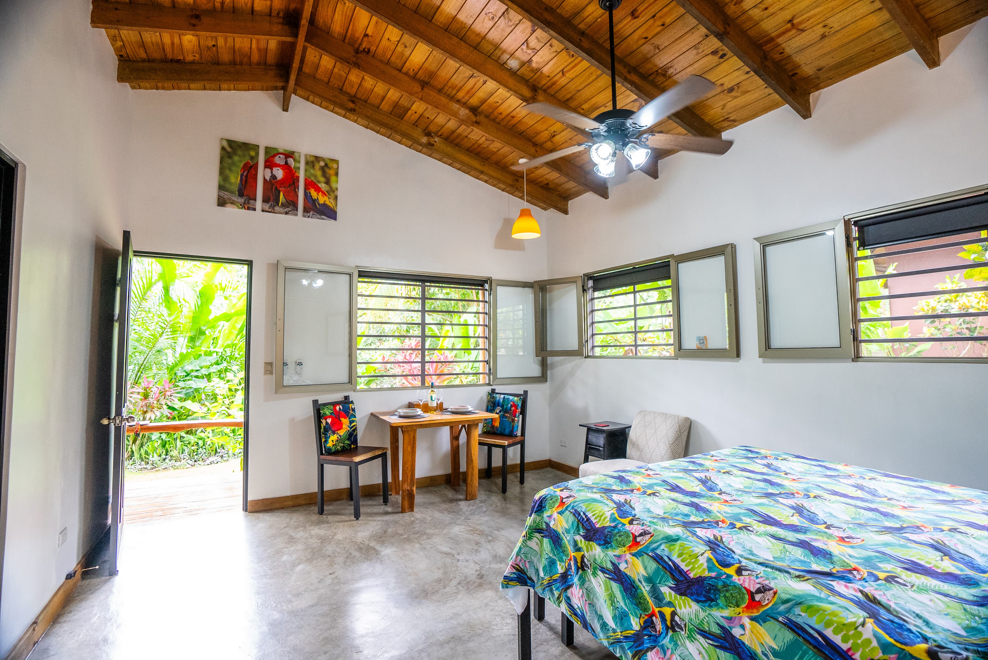 Macaw Villa with air conditioning, kitchen, covered deck, pool, and access to the gardens