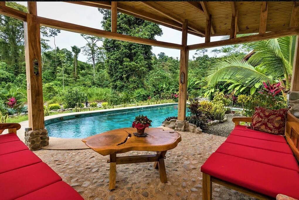 Massive swimming pool with covered ranchero