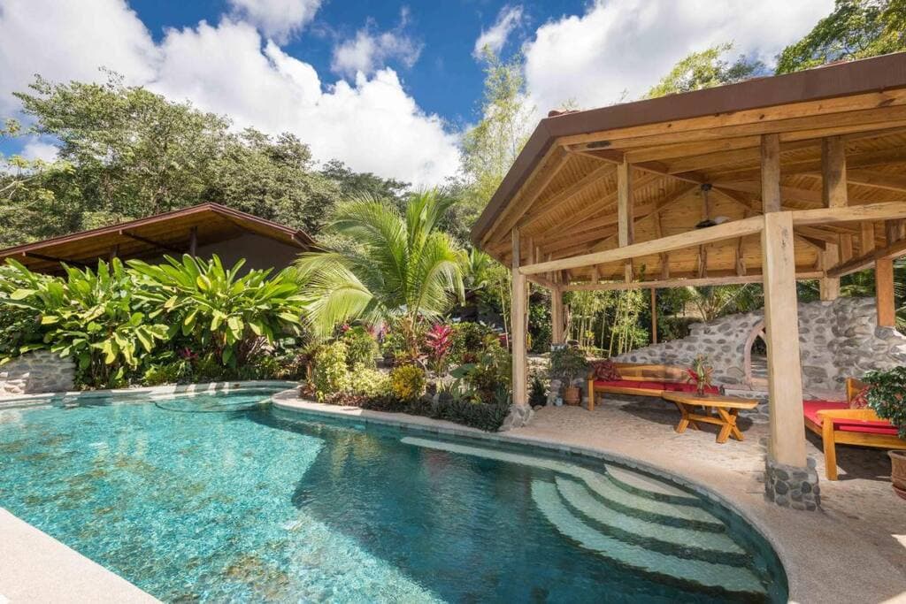 Massive pool overlooking the river and gardens