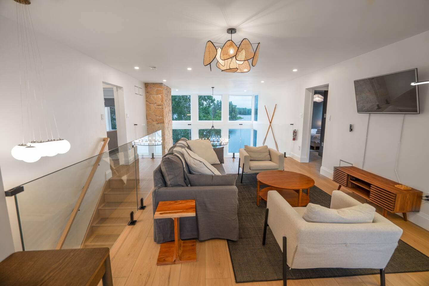 Loft on 3rd floor overlooking 2nd floor living room with view of waterfront. Loft features a queen sized pull-out and TV. 